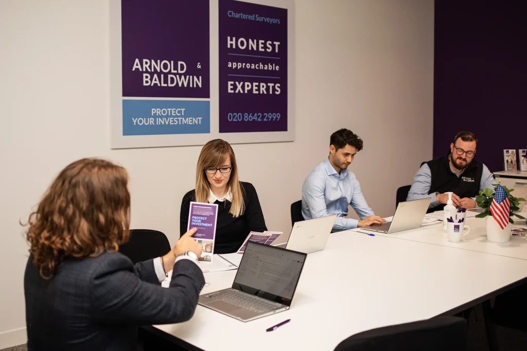 Meeting room branding for chartered surveyors arnold & baldwin