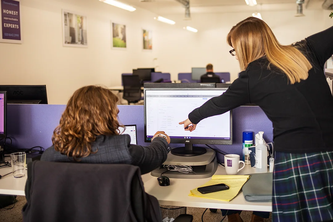 Sales and customer service team in a chartered surveyors office