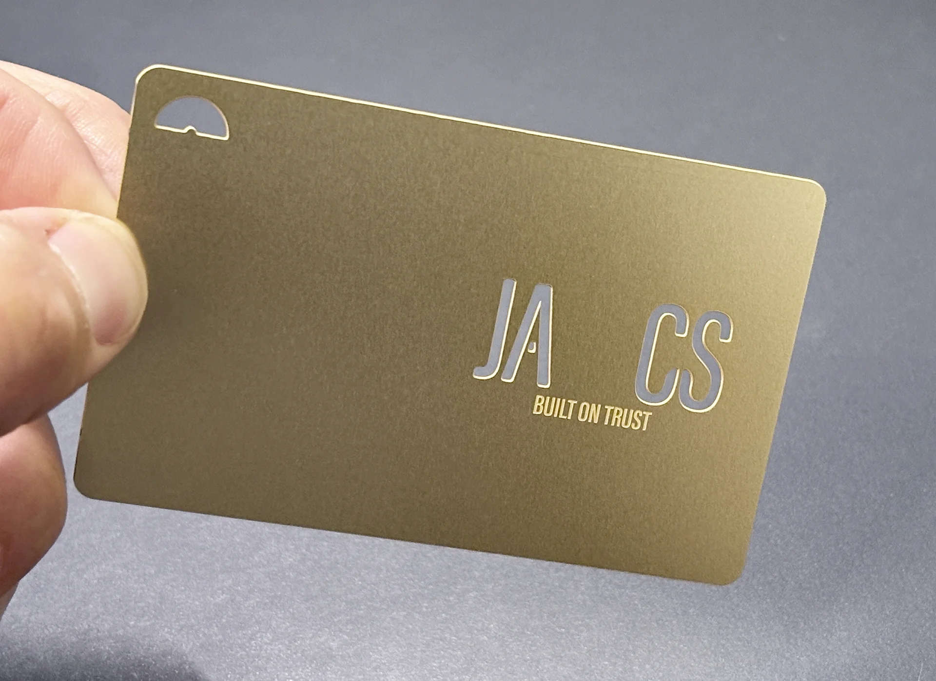 Ja-cs gold laser cut business cards for surveyors in hertfordshire