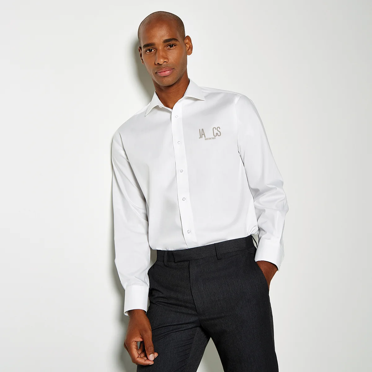 White shirt branded with ja-cs identity