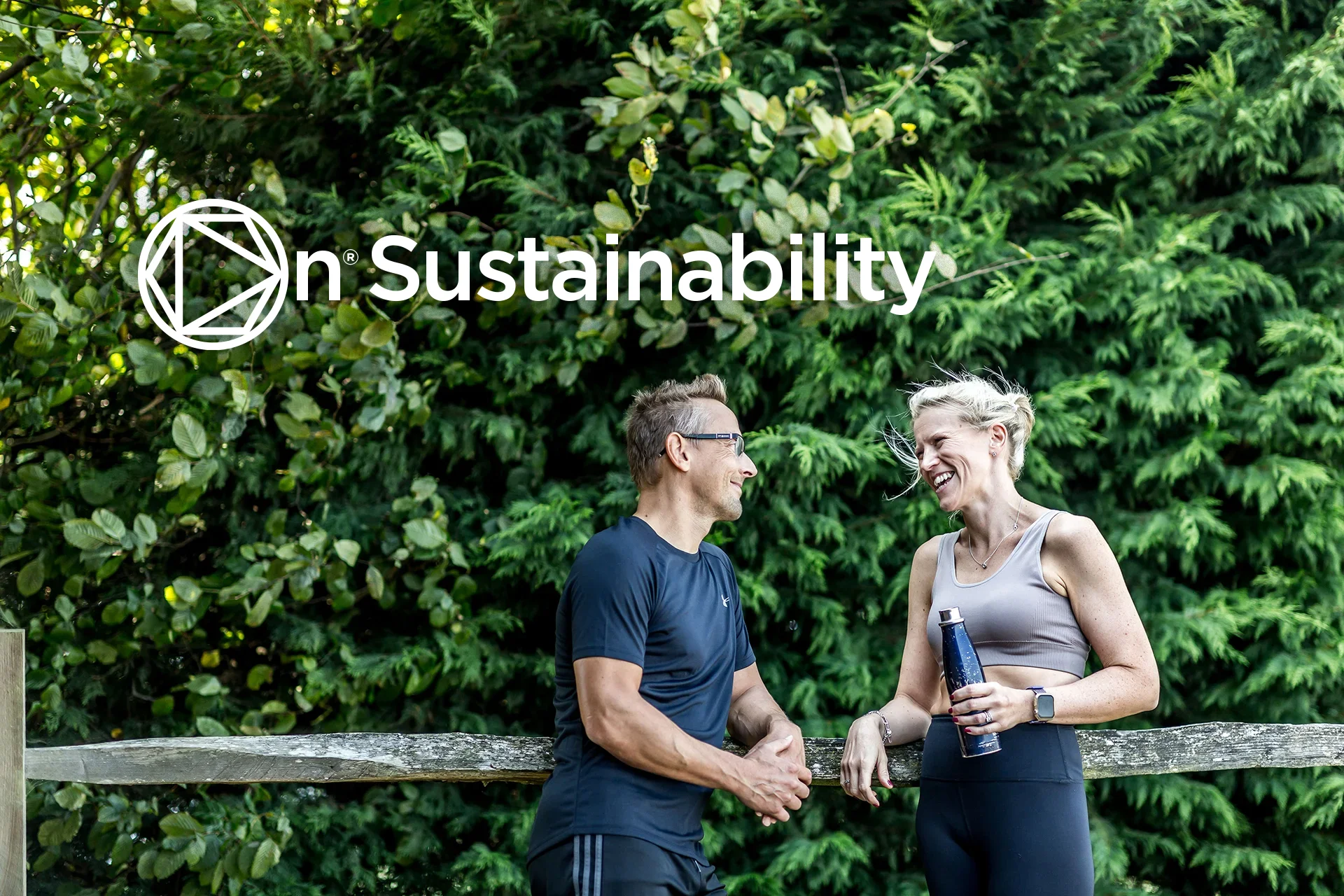 Dom and chris heighton stood in front of green shrubbery after a run, discussing sustainability solutions
